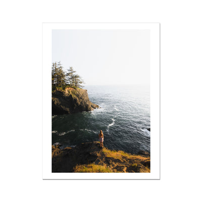 Woman standing alone on a seacliff Fine Art Print