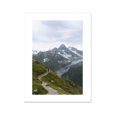 Man walking on a footpath up the French alps Fine Art Print
