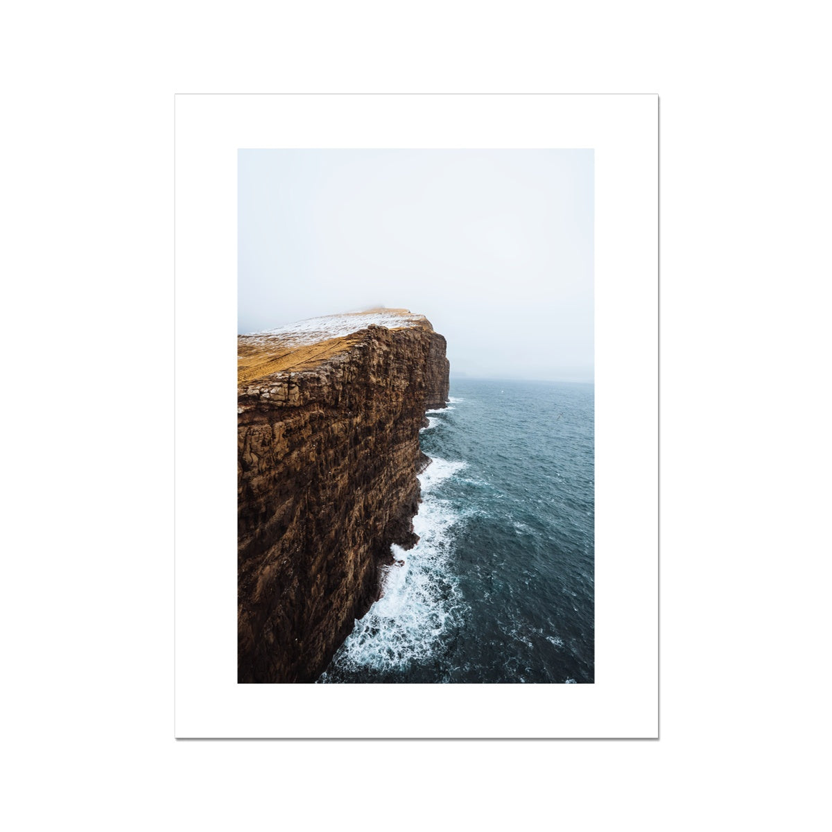 Waves hitting the cliffs in the Faroe Islands Fine Art Print